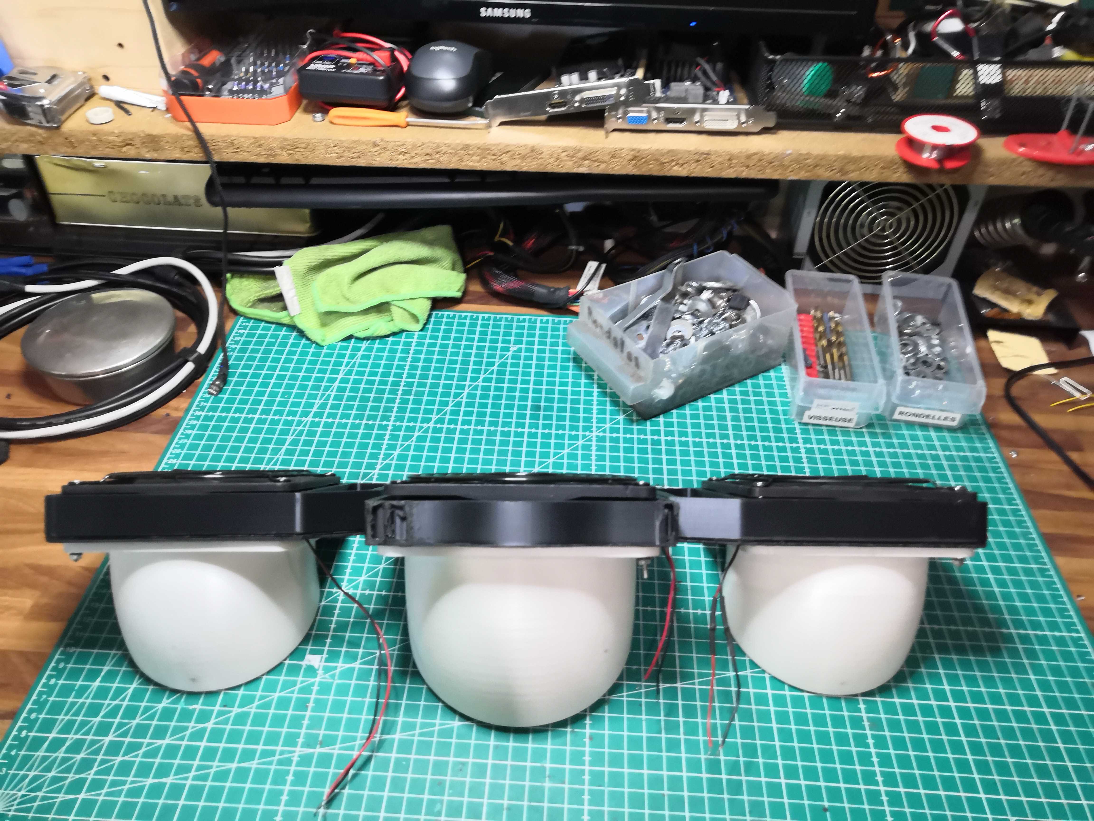 The three assemblies complete, nozzle outlets facing downward