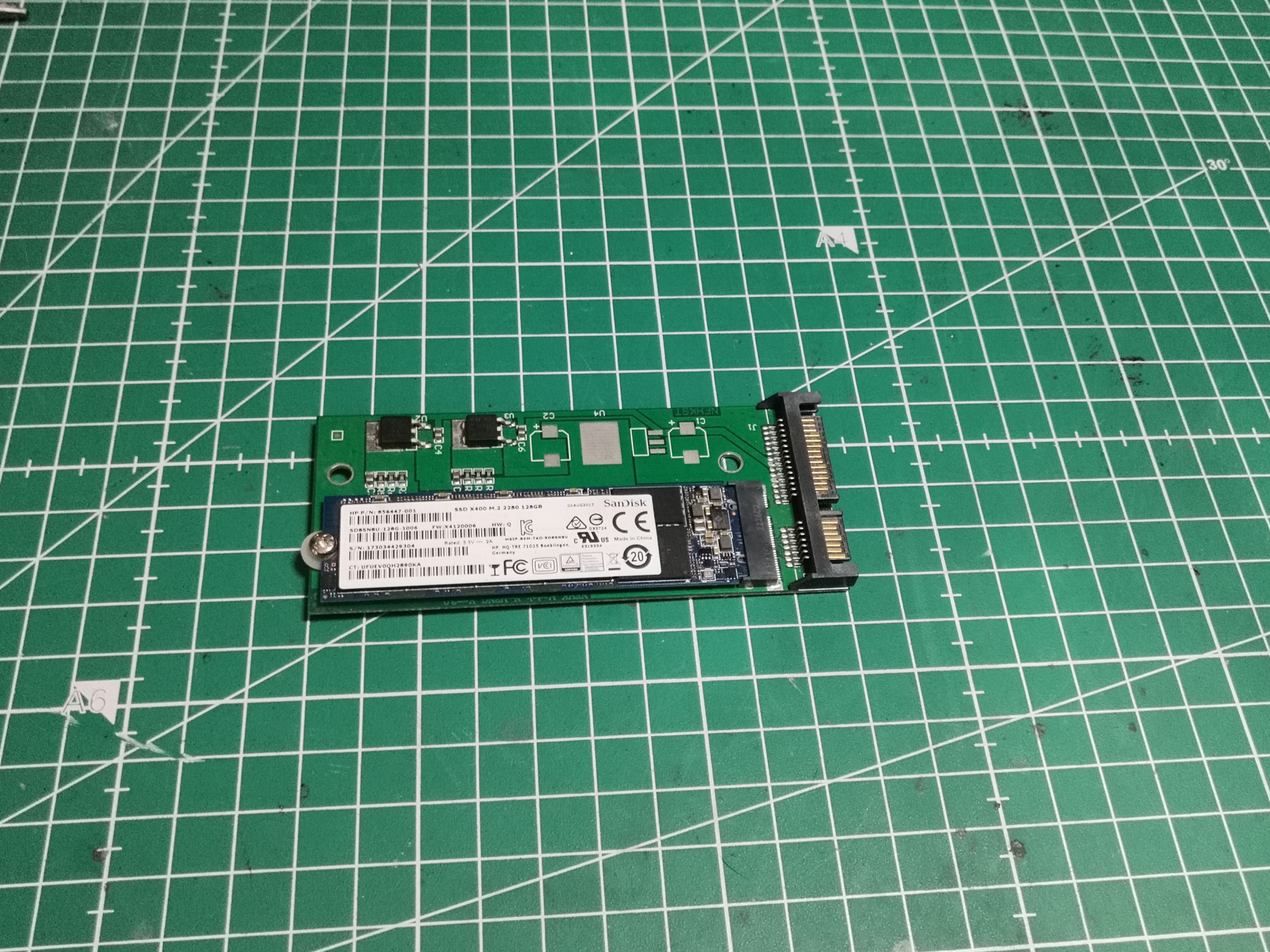 SSD inserted into the adapter — the assembly in 2.5" format