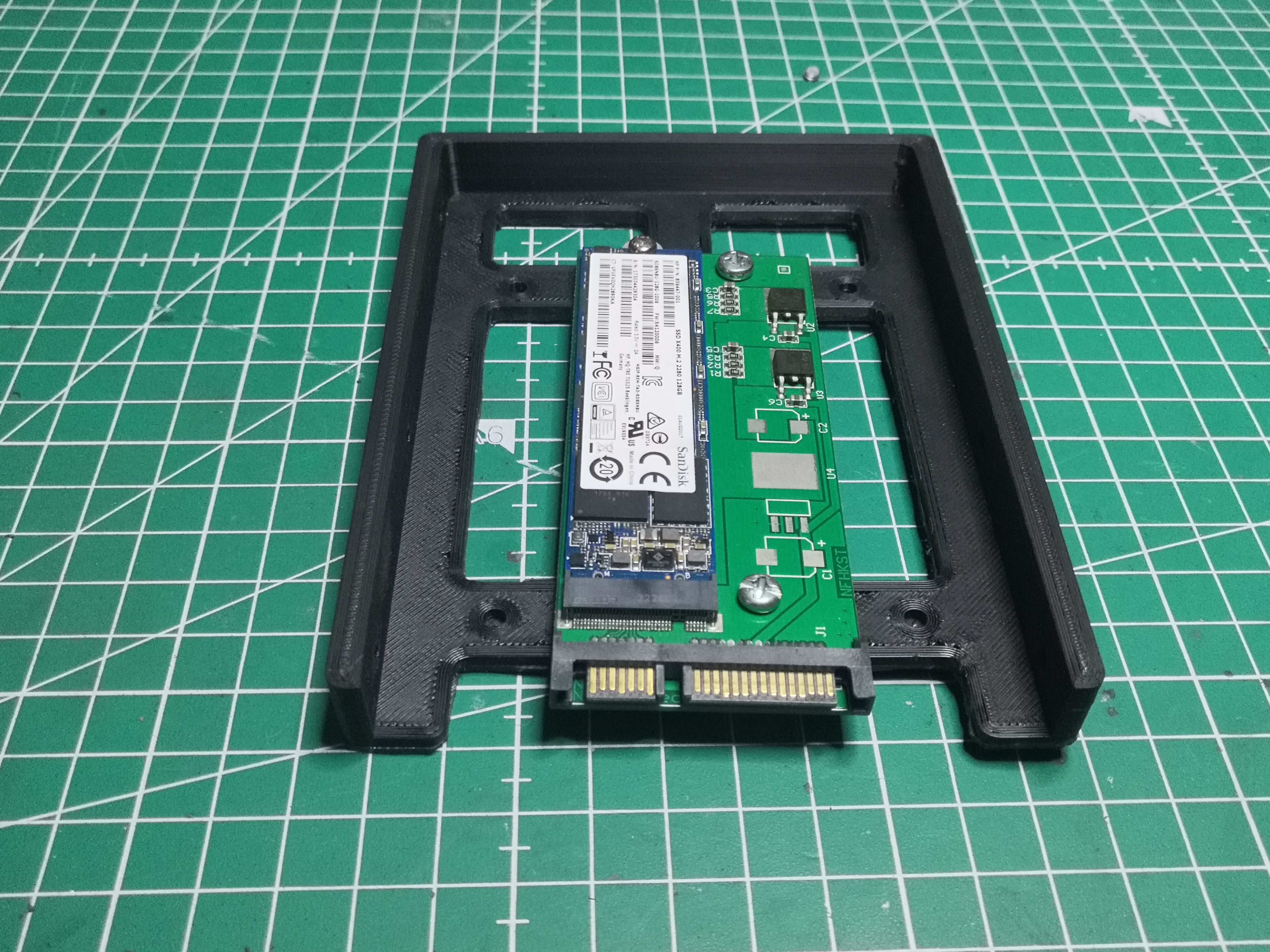 SSD + adapter assembly in the caddy