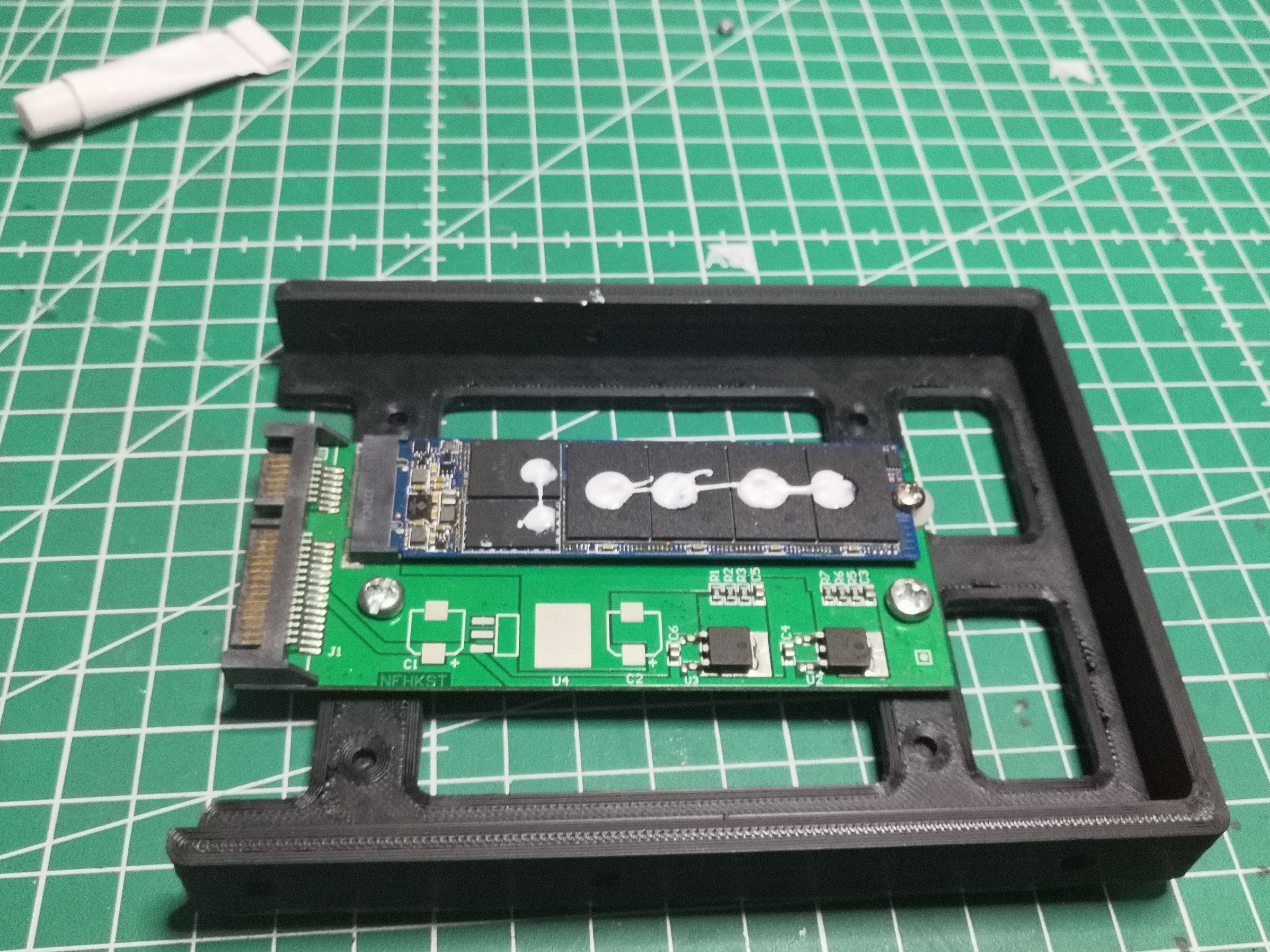 Dots of thermal glue before installing the heatsink