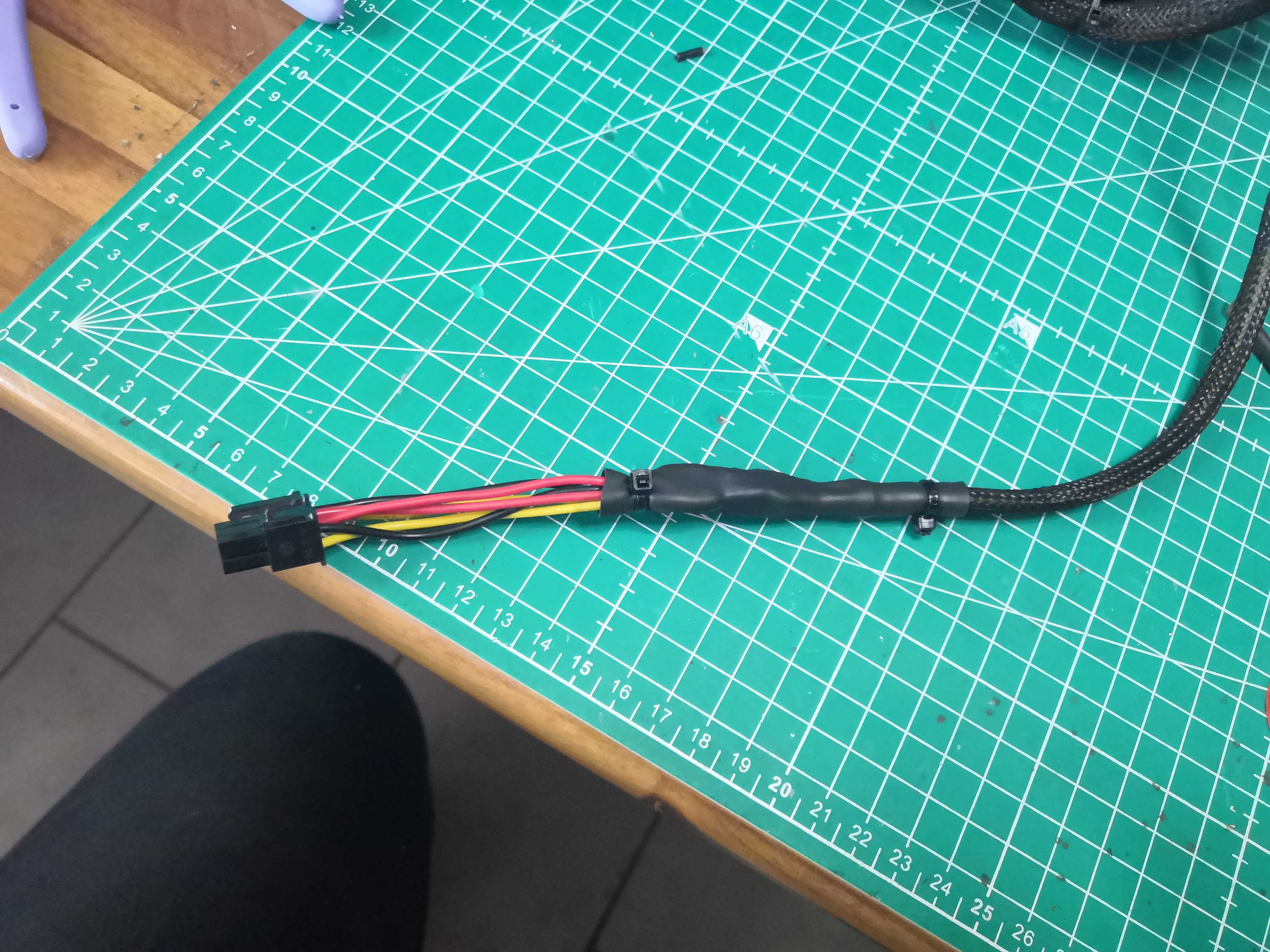 Finish — heat-shrink tubing applied, cable ties
